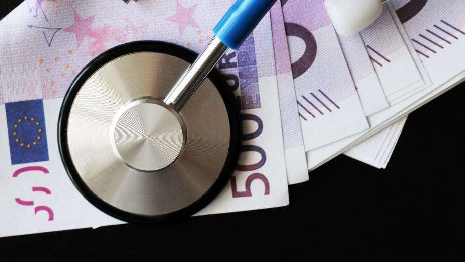 medical stethoscope on euro bills